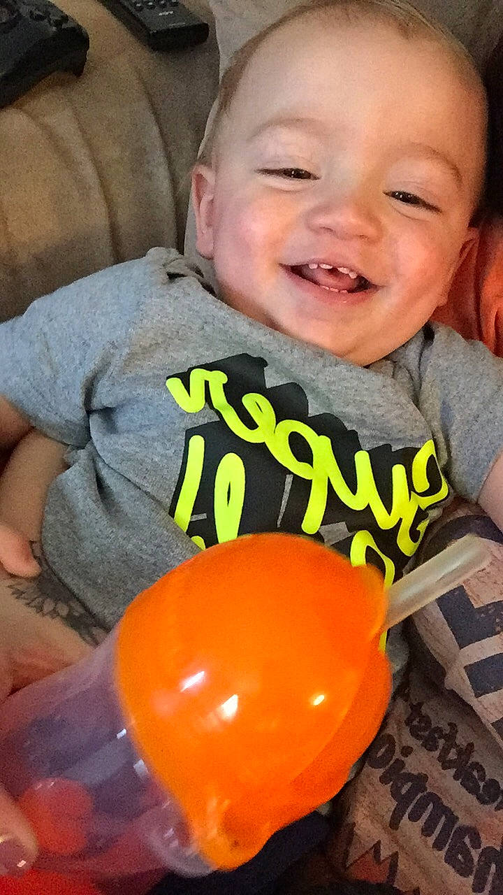 Kurtis joined the competition — help win amazing prizes! baby, ball, child, fun, joy, orange, person, play, smile, toddler