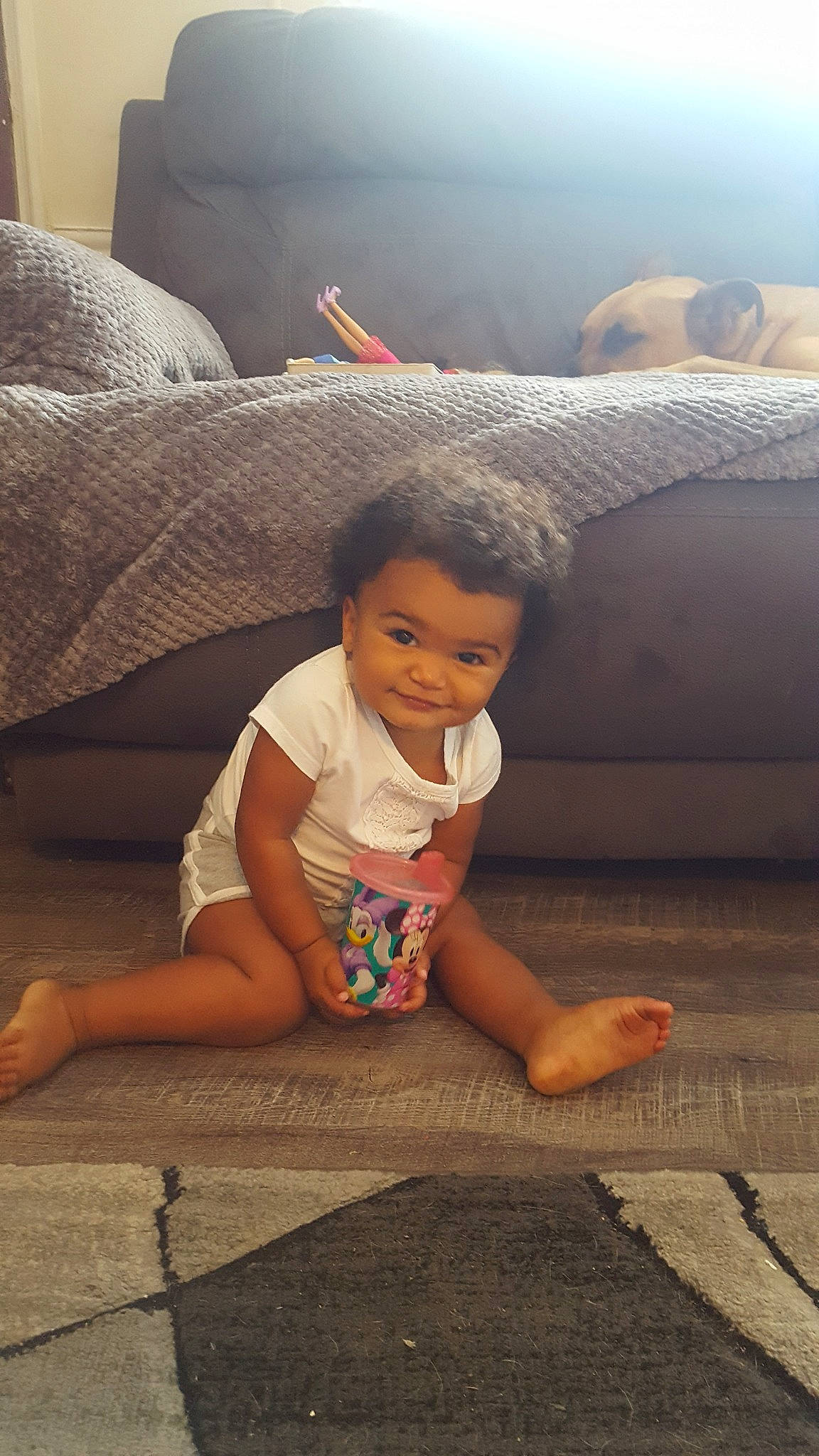 Emalynn is registered to the contest to win money with this photo: barefoot, child, crawling, floor, flooring, joy, leg, person, sitting, toddler