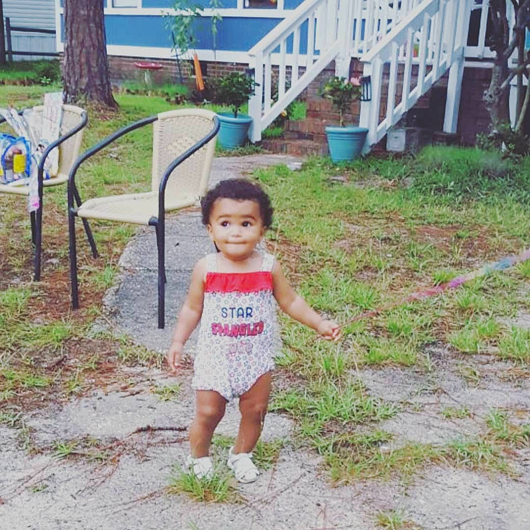 Emalynn is registered to the contest to win money with this photo: child, grass, person, plant, play, smile, summer, toddler, vacation, walking