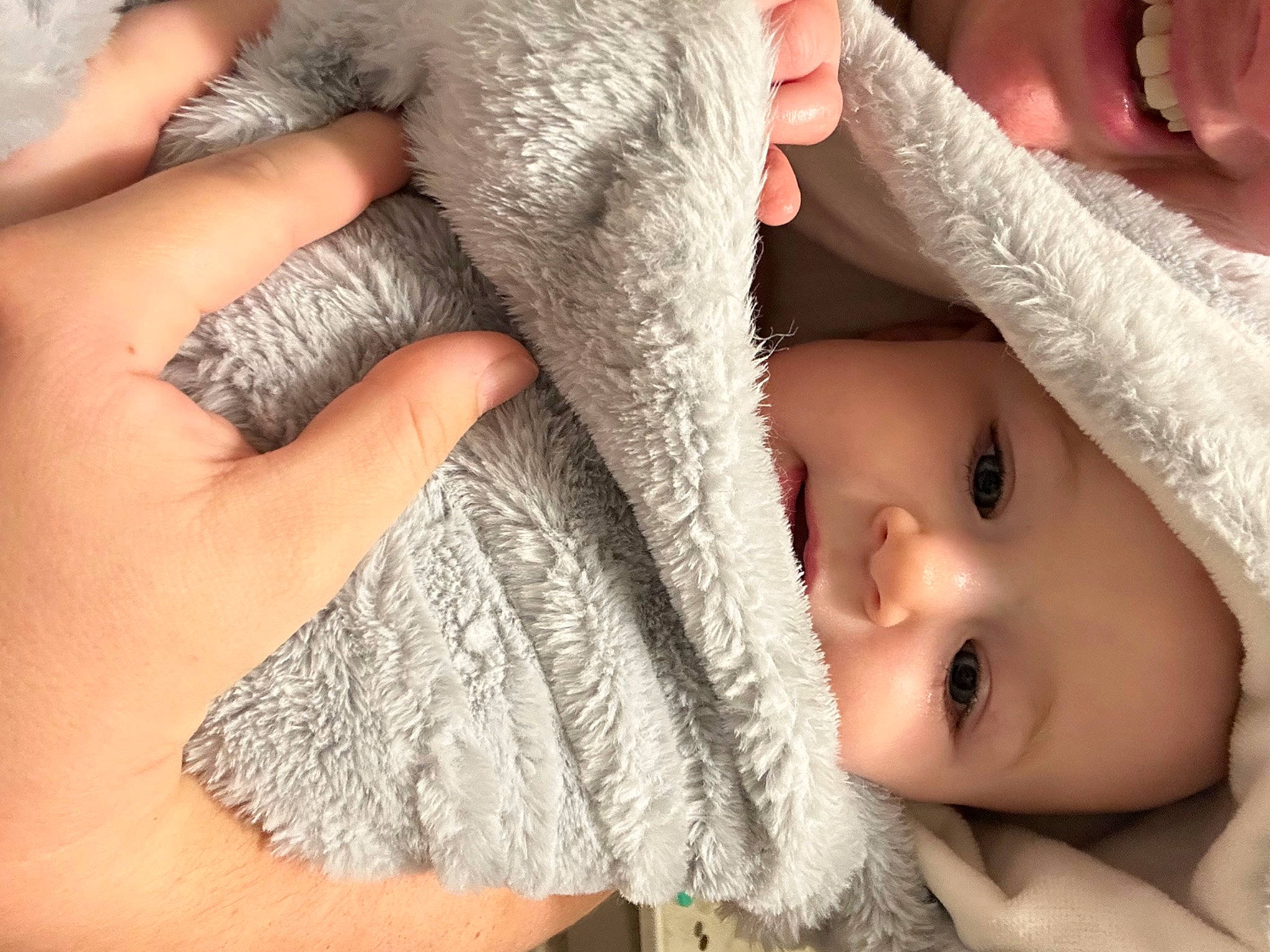 Myla is registered to the contest to win money with this photo: baby, cheek, eye, eyebrow, eyelash, finger, gesture, hand, hat, headwear, iris, joint, lip, mouth, nail, neck, nose, person, skin, thumb