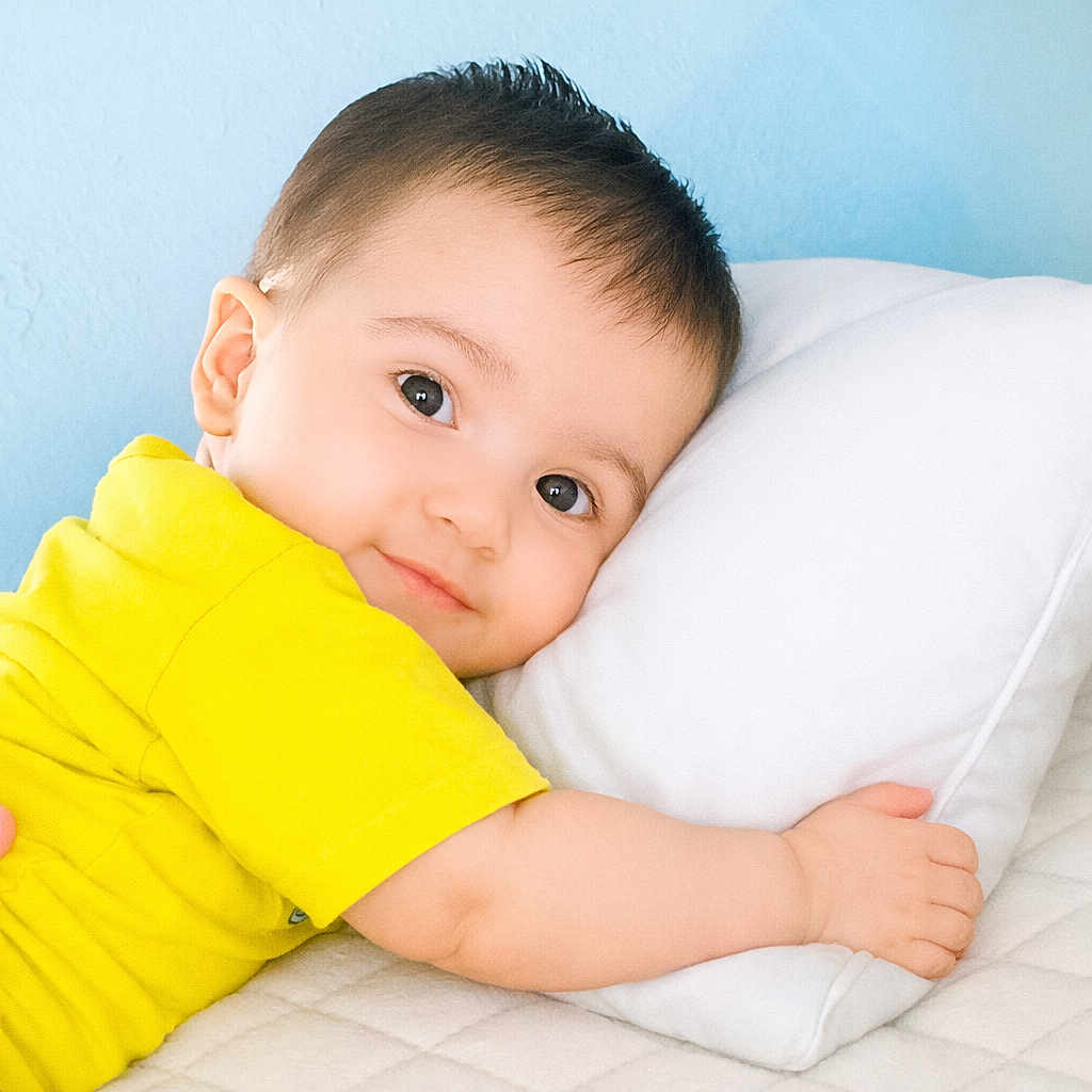Muhammad-Bin-zubair joined the competition — help win amazing prizes! adorable, baby, bed, bedding, blue_background, child, close_up, cozy, cuddling, eyes, face, hair, indoor, infant, lying_down, photography, portrait, smiling, white_pillow, yellow_outfit