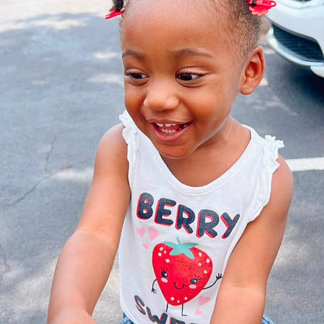 Jianna joined the competition — help win amazing prizes! car, child, city, clothing, face, female, girl, happy, head, pants, person, photography, portrait, road, shorts, street, t_shirt, transportation, urban, vehicle