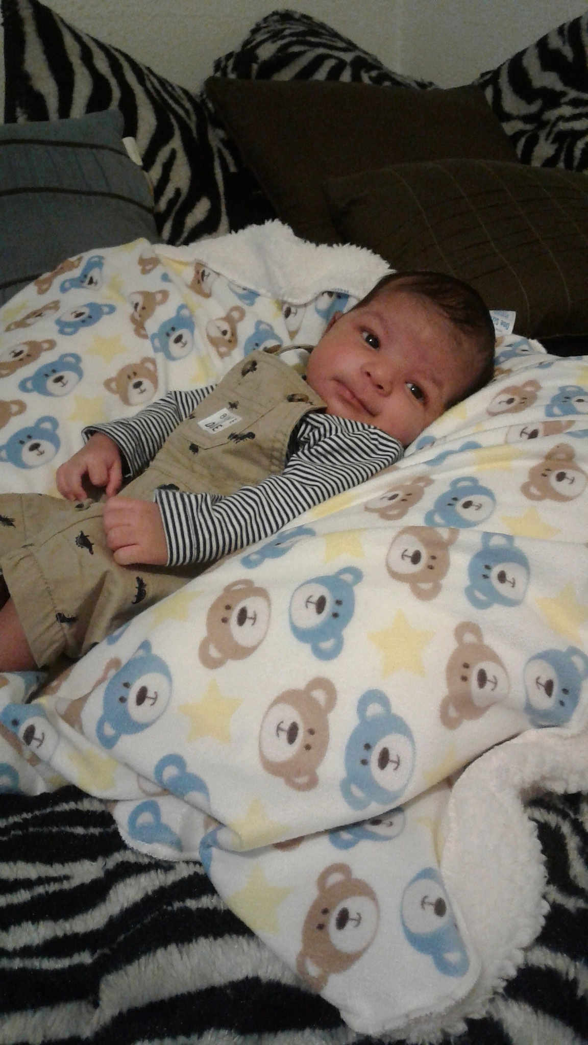 Armon is registered to the contest to win money with this photo: arm, baby_products, bed, bedding, bedtime, blanket, child, day, design, eye, head, infant, linens, material, nose, person, product, skin, sleep, textile