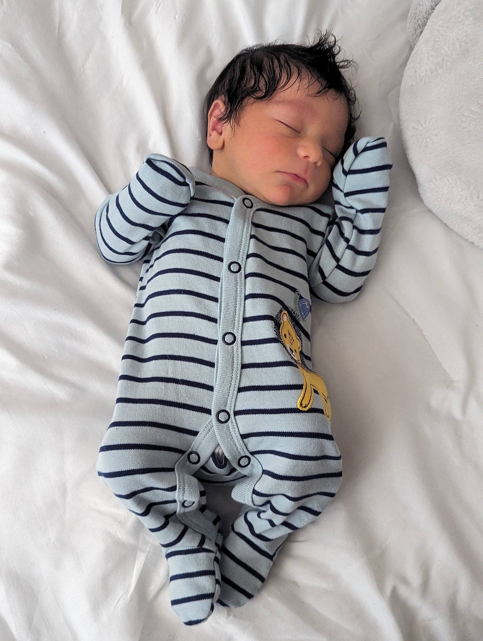 Callum joined the competition — help win amazing prizes! baby, baby_products, baby_sleeping, baby_toddler_clothing, bedding, bedtime, child, collar, comfort, face, fur, hood, hoodie, linens, pattern, person, portrait_photography, room, sleeve, t_shirt