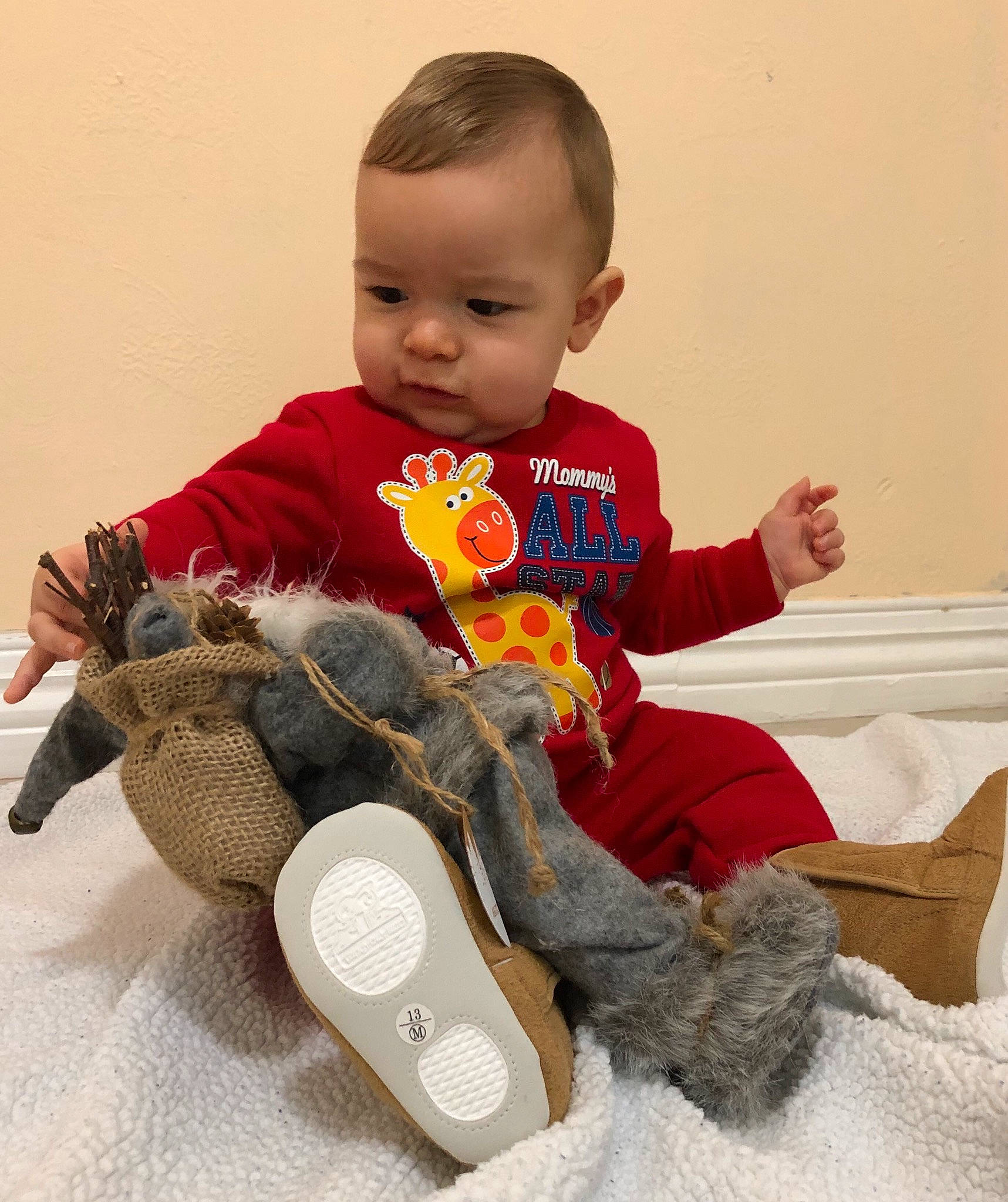 Iker is registered to the contest to win money with this photo: child, infant, material, person, play, plush, product, stuffed_toy, textile, toddler, toy
