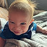 baby, blanket, blue_clothing, child, couch, cozy, cute, expression, face, hair, indoor, infant, light, person, playful, skin, smile, toddler, window, young