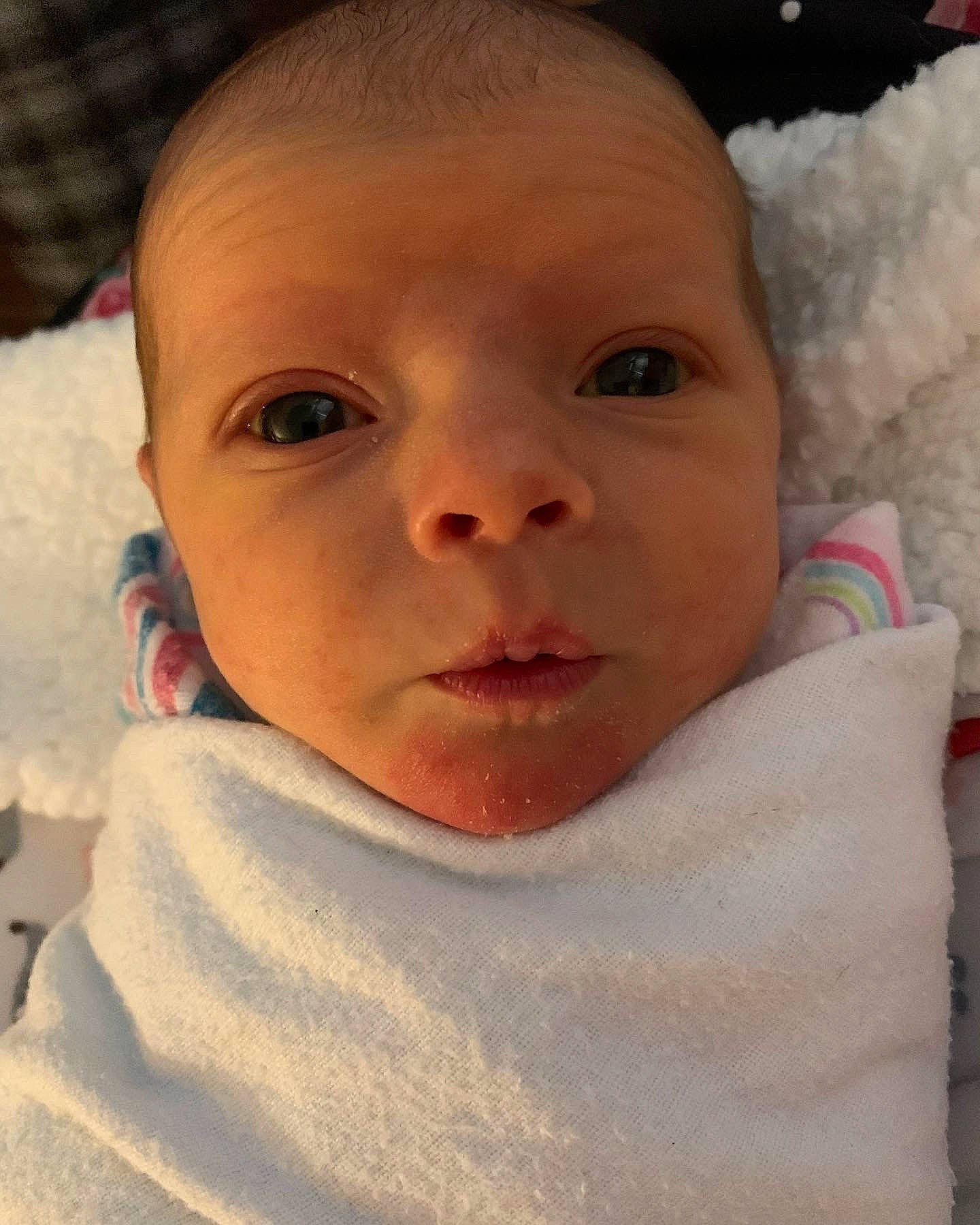 Brynne is registered to the contest to win money with this photo: baby, baby_toddler_clothing, cheek, child, chin, close_up, comfort, eye, eyebrow, eyelash, happy, head, iris, lip, mammal, mouth, nose, person, skin, sleeve