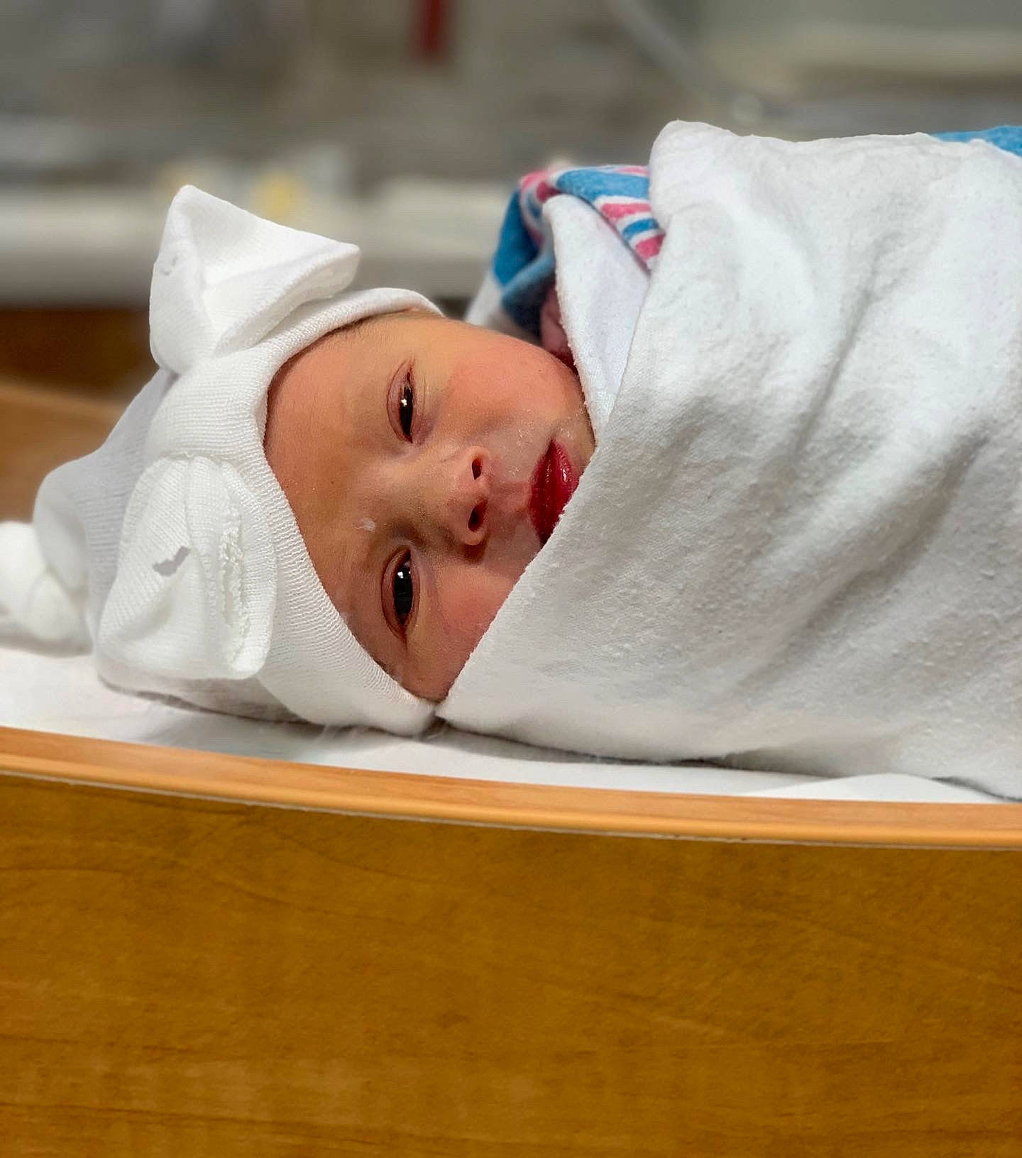 Brynne is registered to the contest to win money with this photo: baby, baby_products, baby_safety, baby_sleeping, baby_toddler_clothing, birth, cap, child, childbirth, comfort, event, hat, headgear, headwear, hospital, linens, nap, person, room, sleep