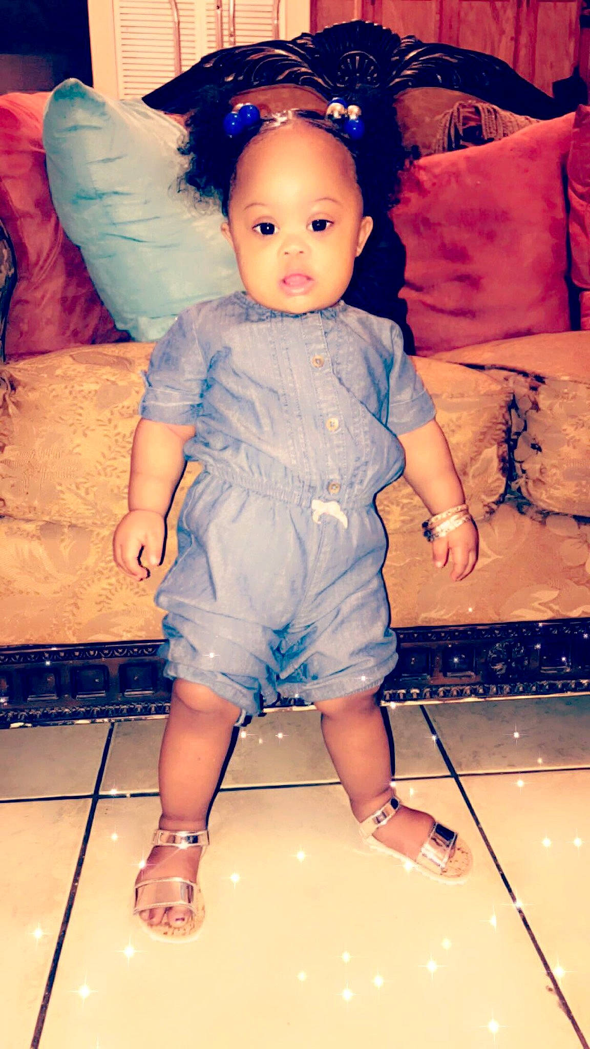 Leah is registered to the contest to win money with this photo: baby, blue, cheek, child, child_model, dress, eye, face, fictional_character, floor, fun, head, leg, person, pink, play, shoe, skin, smile, standing