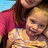 Delilah joined the competition — help win amazing prizes! brown_hair, candid, casual, children, close_up, family, floral_dress, girl, happy, indoors, long_hair, pink_shirt, portrait, seated, selfie, siblings, smiling, toddler, tongue_out, warm_lighting