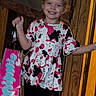 Delilah joined the competition — help win amazing prizes! black_pants, casual_clothing, child, colorful_package, doorway, full_body, girl, hair_bow, happy, home, indoor, long_hair, patterned_clothing, pink_bow, portrait, smiling, standing, toddler, toy, wooden_door
