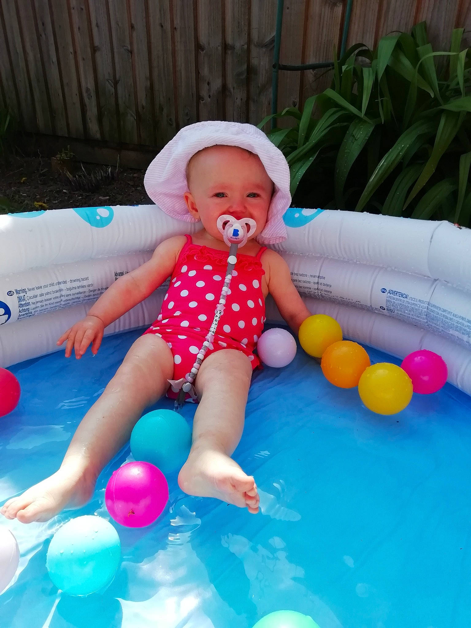 Harlie is registered to the contest to win money with this photo: baby, baby_products, child, fun, games, inflatable, joy, leisure, person, play, product, recreation, swimming_pool, toddler, toy, vacation
