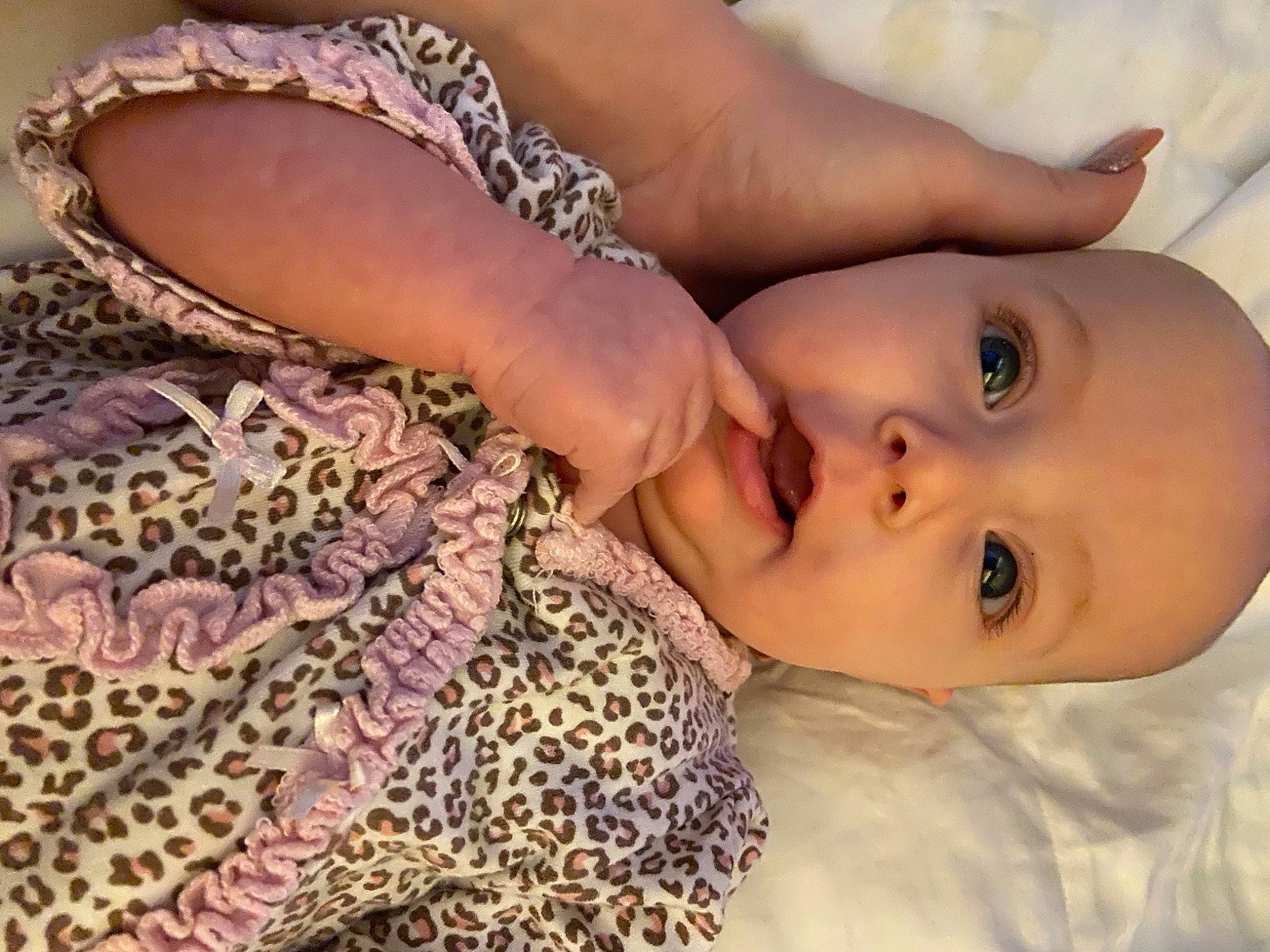 Ella is registered to the contest to win money with this photo: baby, beauty, cheek, child, close_up, eye, eyebrow, face, finger, forehead, head, human, lip, mouth, muscle, nose, organ, person, pink, skin