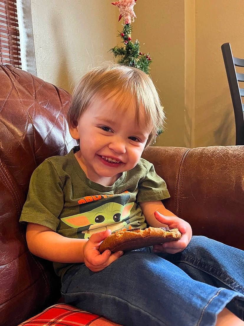 Dallas joined the competition — help win amazing prizes! baby, baby_toddler_clothing, child, comfort, facial_expression, finger, flooring, fun, happy, holiday, joy, lap, living_room, person, picture_frame, plant, room, sitting, smile, toddler