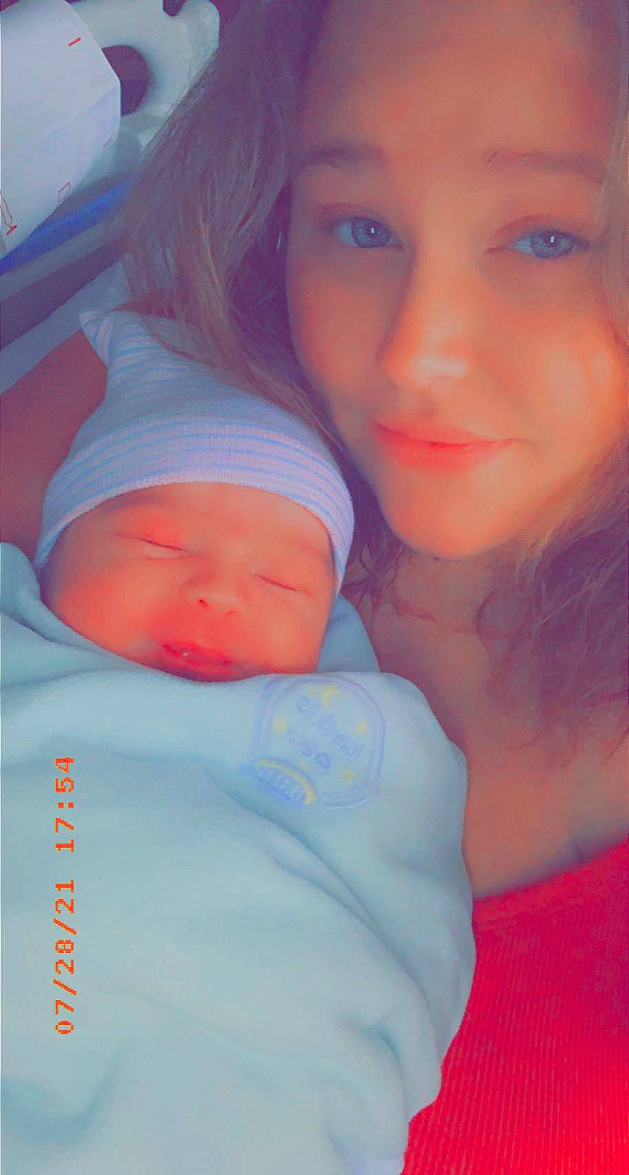 John joined the competition — help win amazing prizes! azure, cheek, child, comfort, electric_blue, eye, eyebrow, eyelash, finger, flash_photography, gesture, happy, lip, mouth, muscle, nose, orange, organ, person, pink