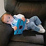 Cameron joined the competition — help win amazing prizes! toddler, child, tablet, blue_suit, white_shirt, bow_tie, white_sneakers, leather_couch, indoor, curious, blue_eyes, red_hair, casual_pose, technology, furniture, relaxing, modern, portrait, young_boy, home