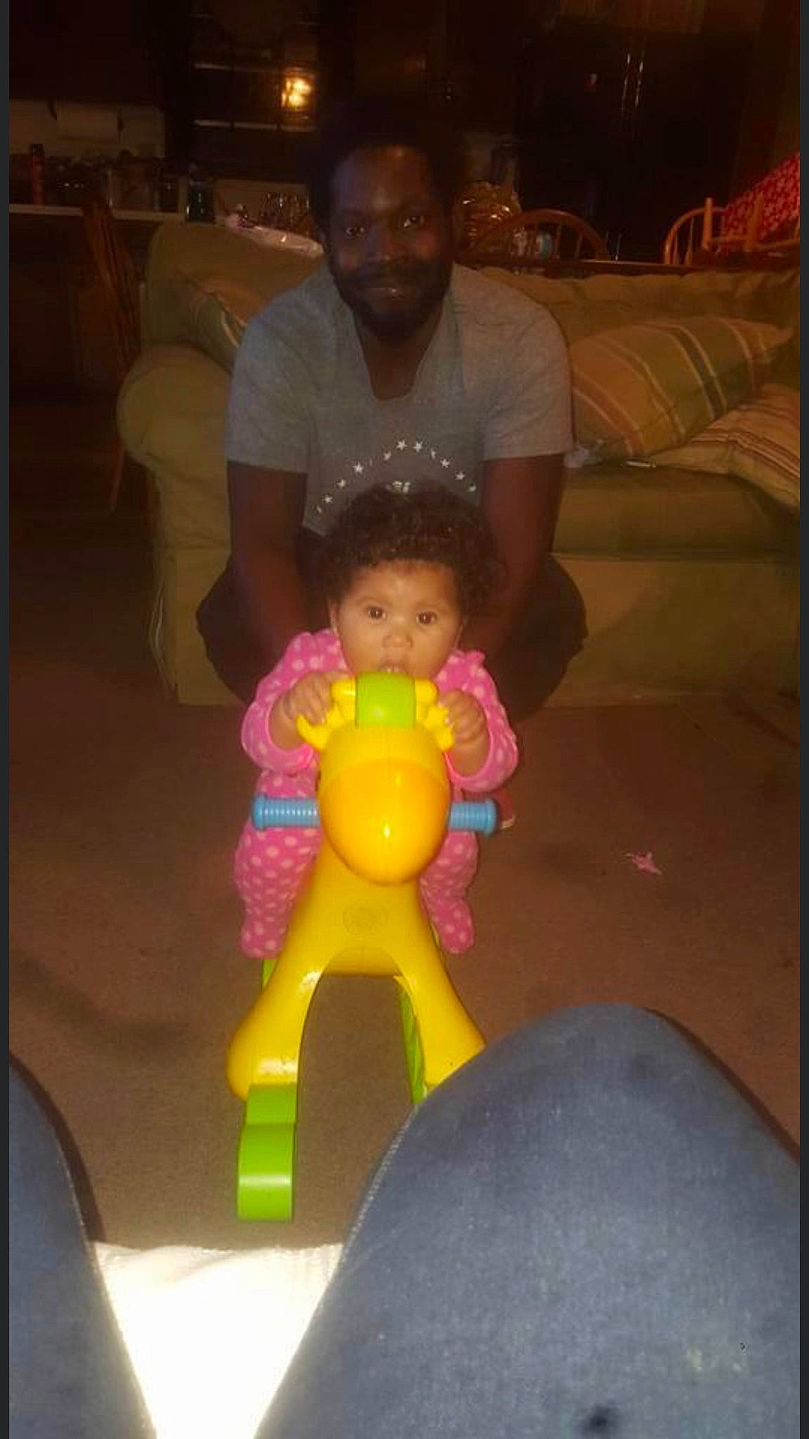 Kaydence is registered to the contest to win money with this photo: balloon, chair, child, event, face, fun, happy, joy, lap, leisure, magenta, party, person, photo_caption, recreation, room, sitting, t_shirt, toddler, toy