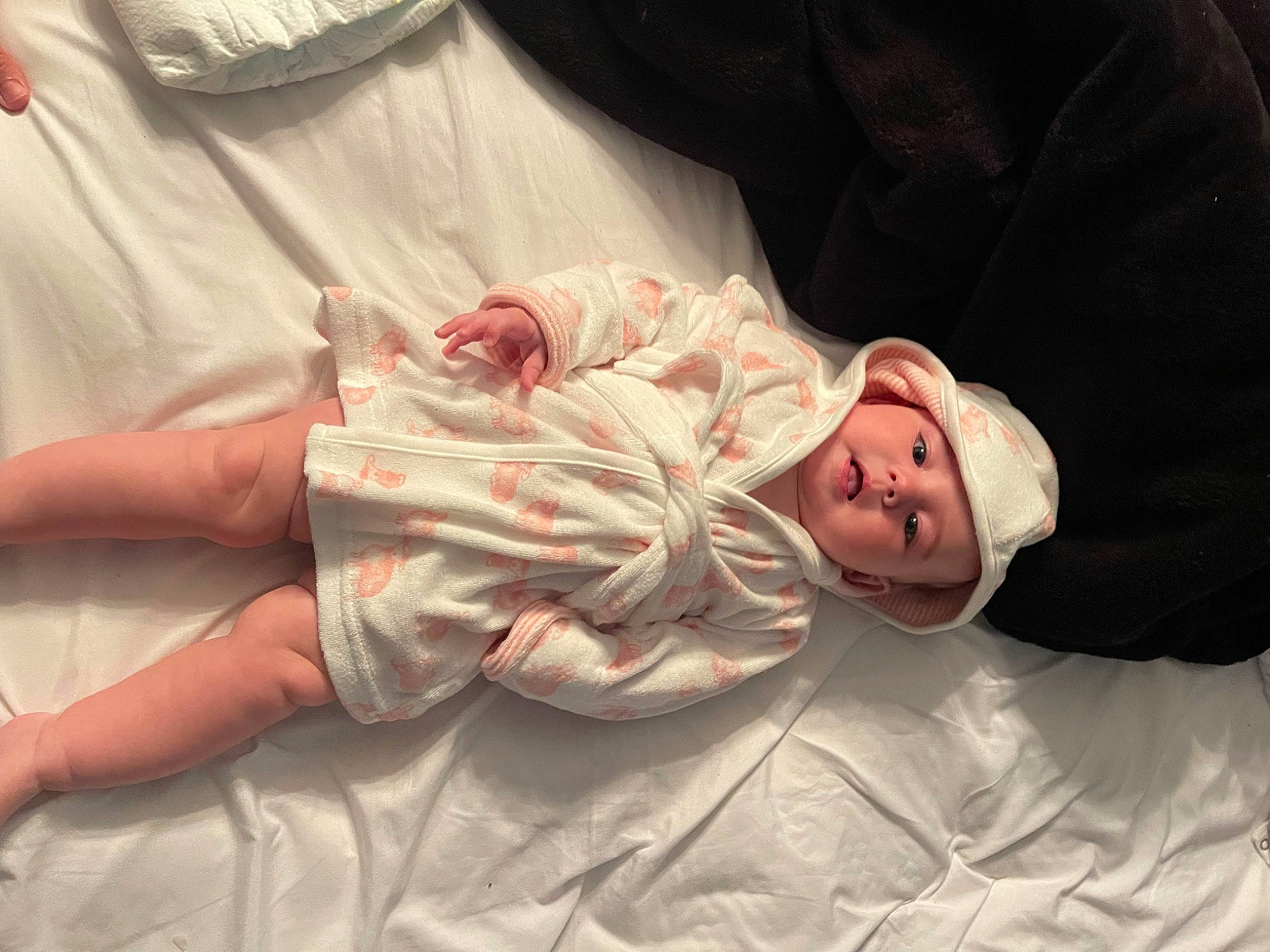 Danielle joined the competition — help win amazing prizes! arm, baby, baby_toddler_clothing, bedding, child, comfort, flesh, gesture, head, headwear, human, human_body, leg, linens, mouth, person, room, skin, sleeve, textile