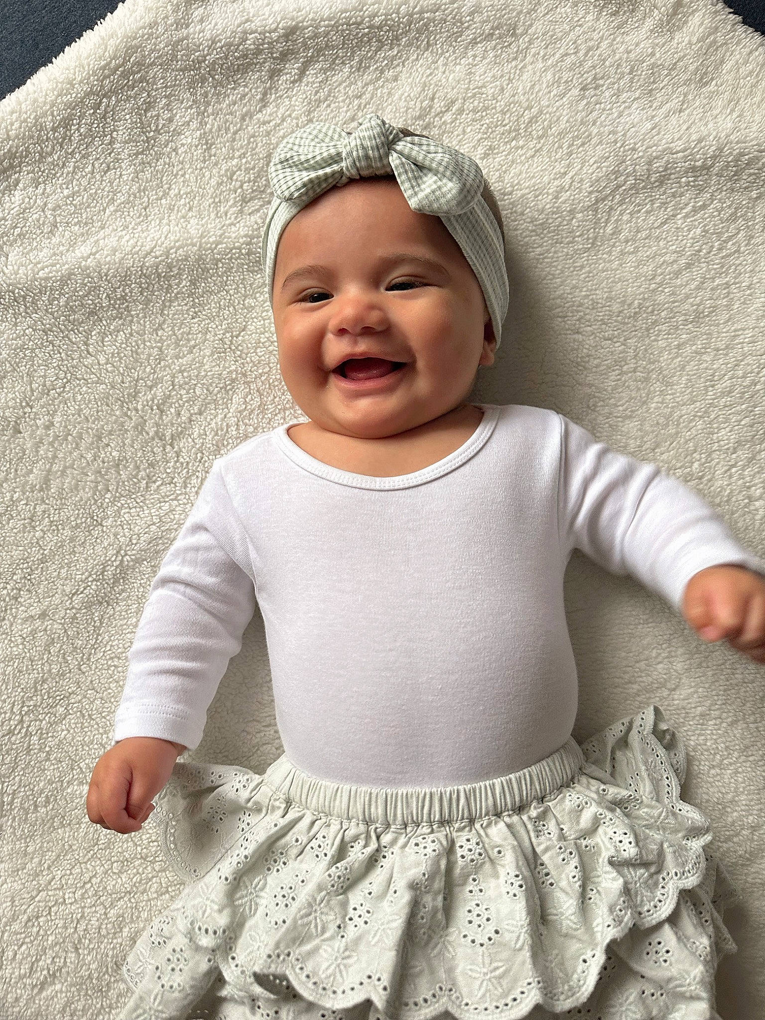 Leila joined the competition — help win amazing prizes! baby, baby_toddler_clothing, beauty, cap, child, face, grey, happy, headwear, iris, joy, outerwear, pattern, person, photograph, pink, skin, sleeve, smile, t_shirt
