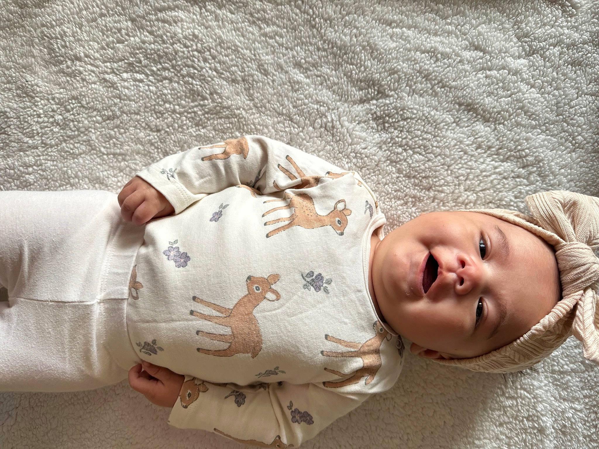 Leila joined the competition — help win amazing prizes! arm, baby, baby_sleeping, baby_toddler_clothing, bedding, child, comfort, flooring, fur, hand, human_body, leg, linens, pattern, person, sitting, skin, sleeve, textile, toddler