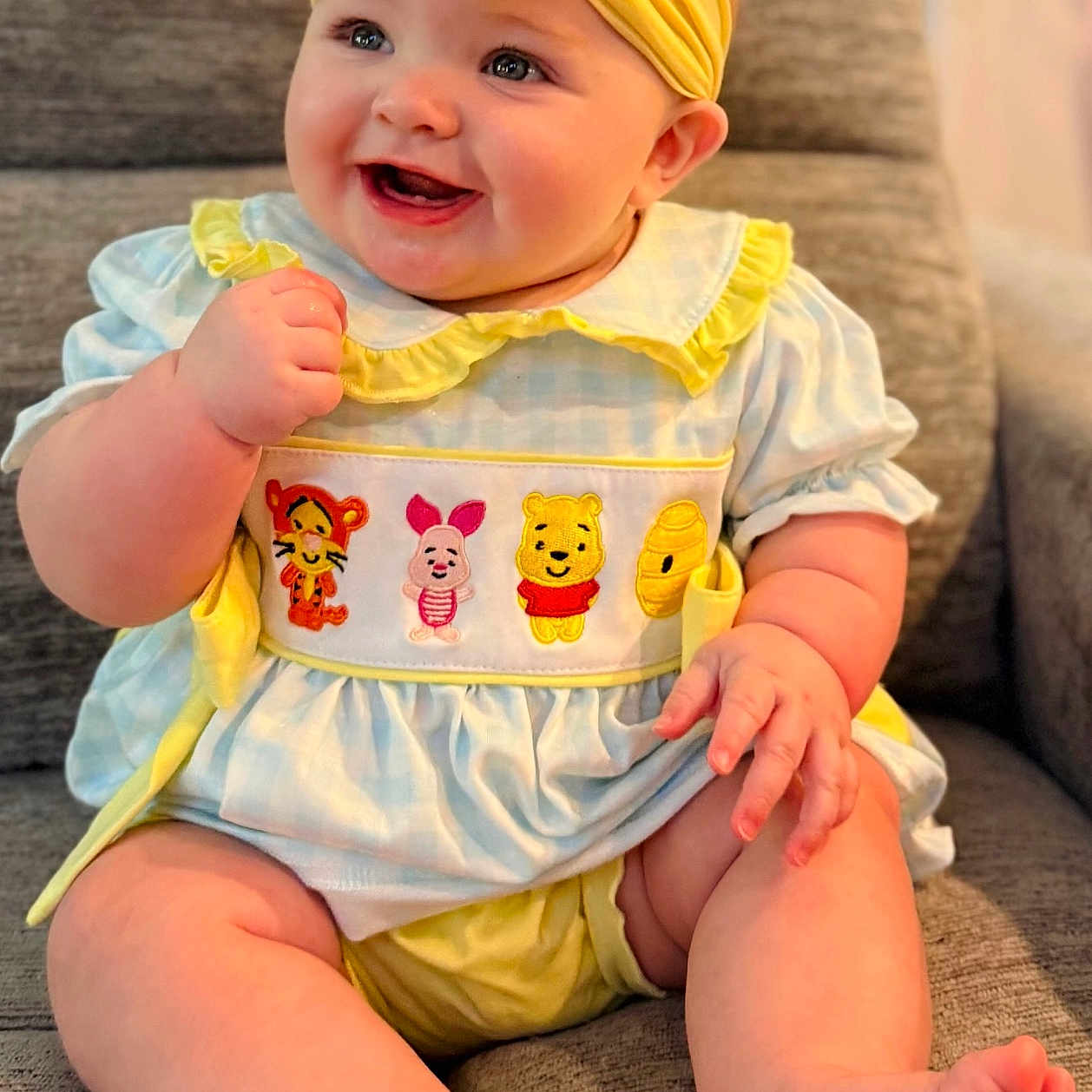 Aria Skye is registered to the contest to win money with this photo: baby, barefoot, blue_dress, child, chubby_legs, cozy, cute, happy, headband, honey_pot, indoor, piglet, pooh, portrait, sitting, smiling, tiger, winnie_the_pooh, yellow_bow, yellow_outfit