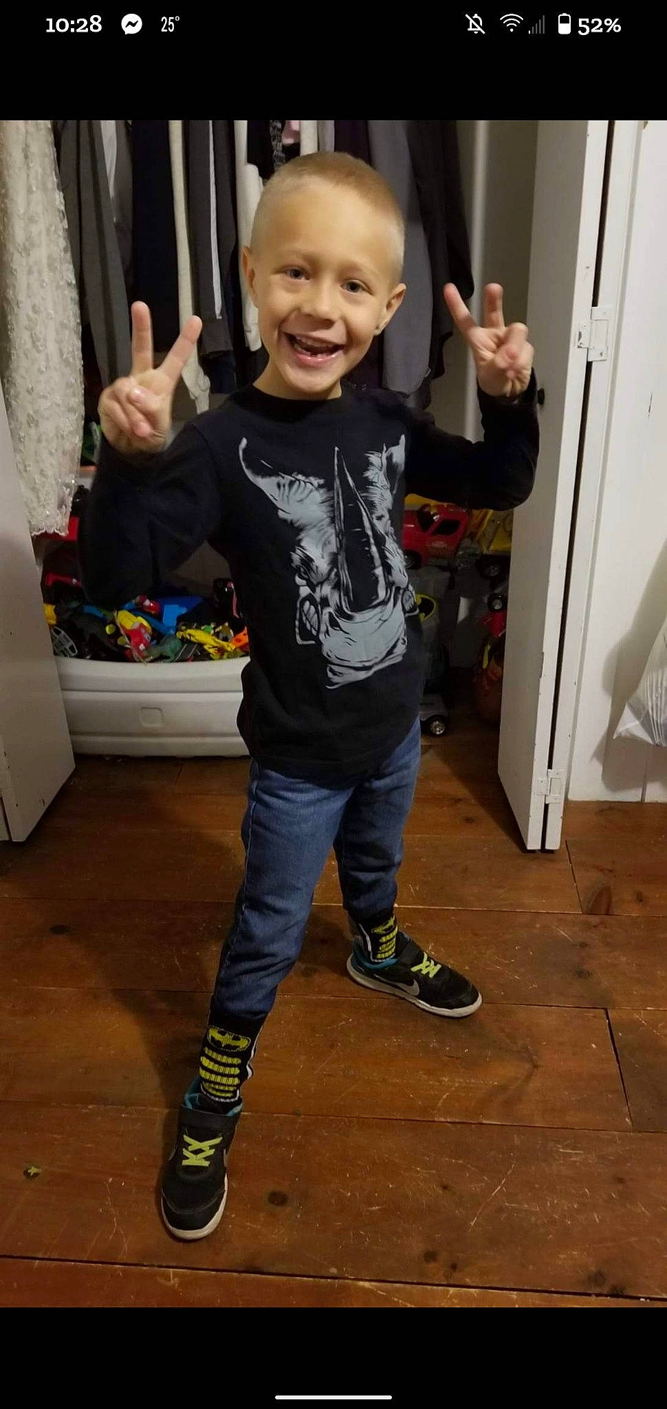 Kolton joined the competition — help win amazing prizes! curtain, door, flooring, fun, gesture, hairstyle, happy, joint, joy, outdoor_shoe, person, shoe, sleeve, smile, snapshot, sneakers, standing, t_shirt, thumb, toddler