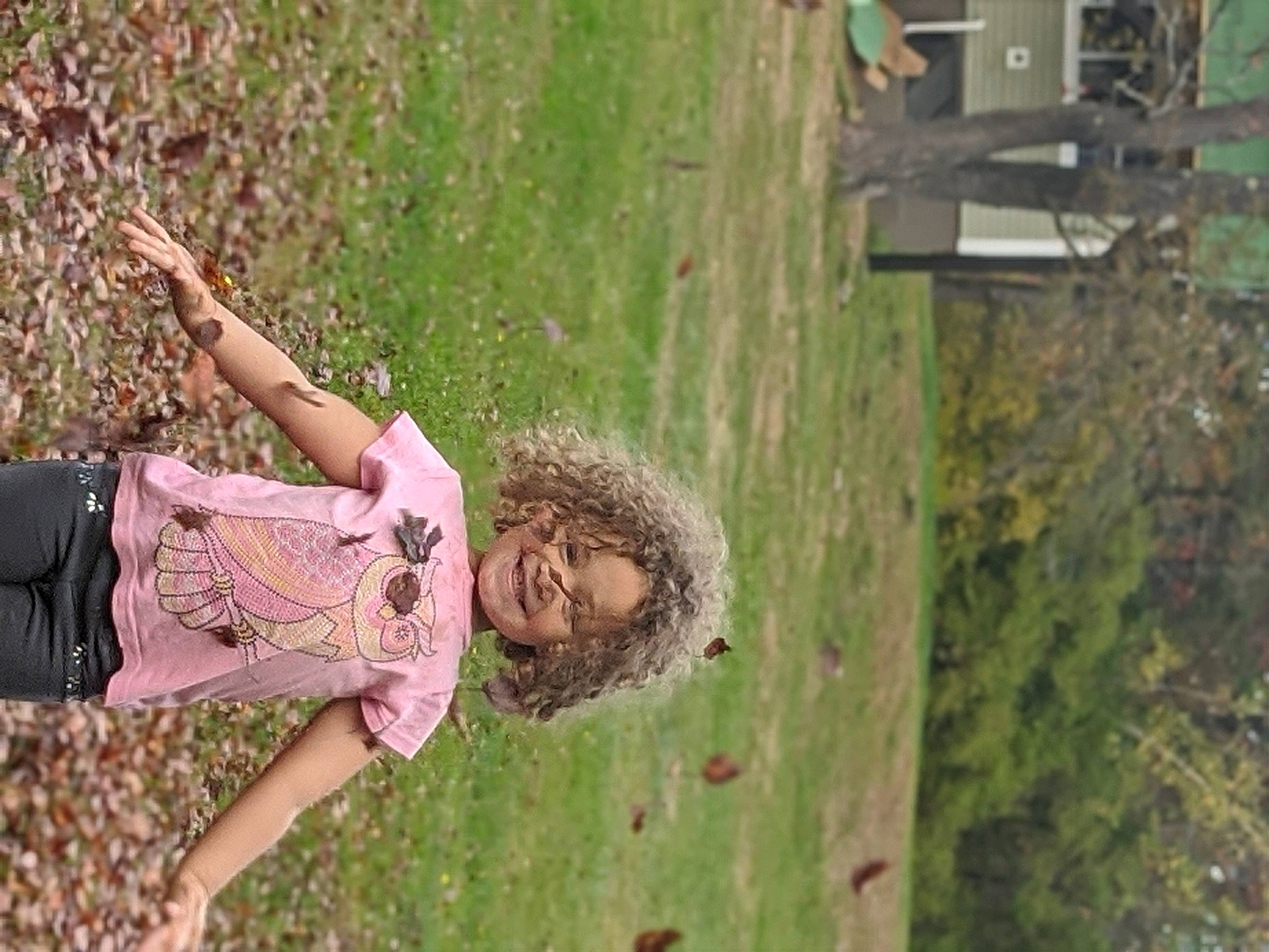 Paisley is registered to the contest to win money with this photo: adventure, child, forest, fun, grass, grass_family, grassland, green, happy, joy, landscape, leisure, people_in_nature, person, plant, recreation, smile, toddler, tree, trunk