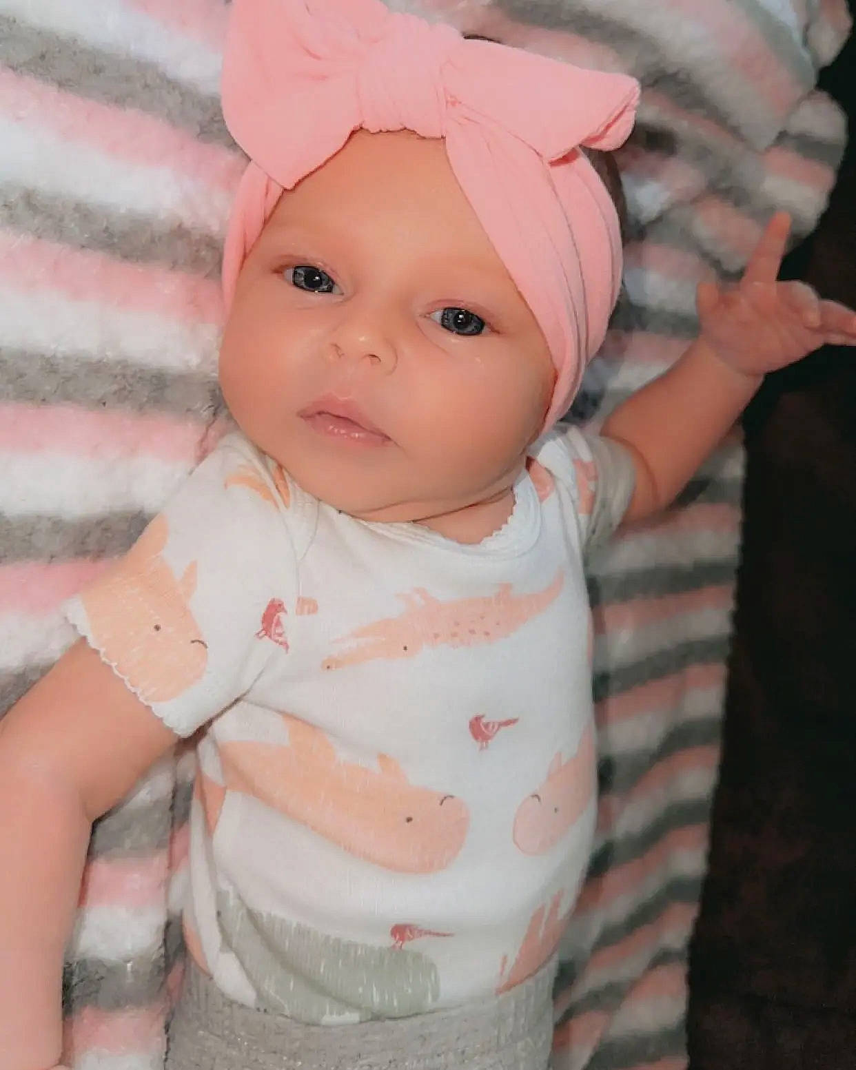 Chloee joined the competition — help win amazing prizes! baby, baby_toddler_clothing, beanie, cap, cheek, child, costume_hat, dress, eye, fashion_accessory, happy, headgear, headwear, iris, linens, lip, pattern, peach, person, pink