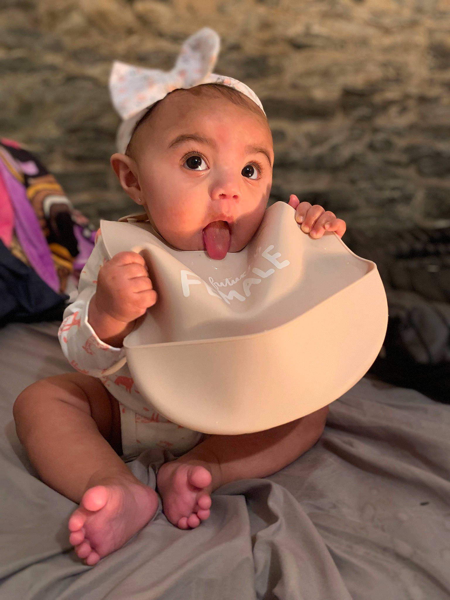 Malani is registered to the contest to win money with this photo: baby, baby_products, cheek, child, comfort, fashion_accessory, finger, flesh, fun, gesture, happy, jewellery, mouth, nose, peach, person, sitting, skin, surprise, thumb