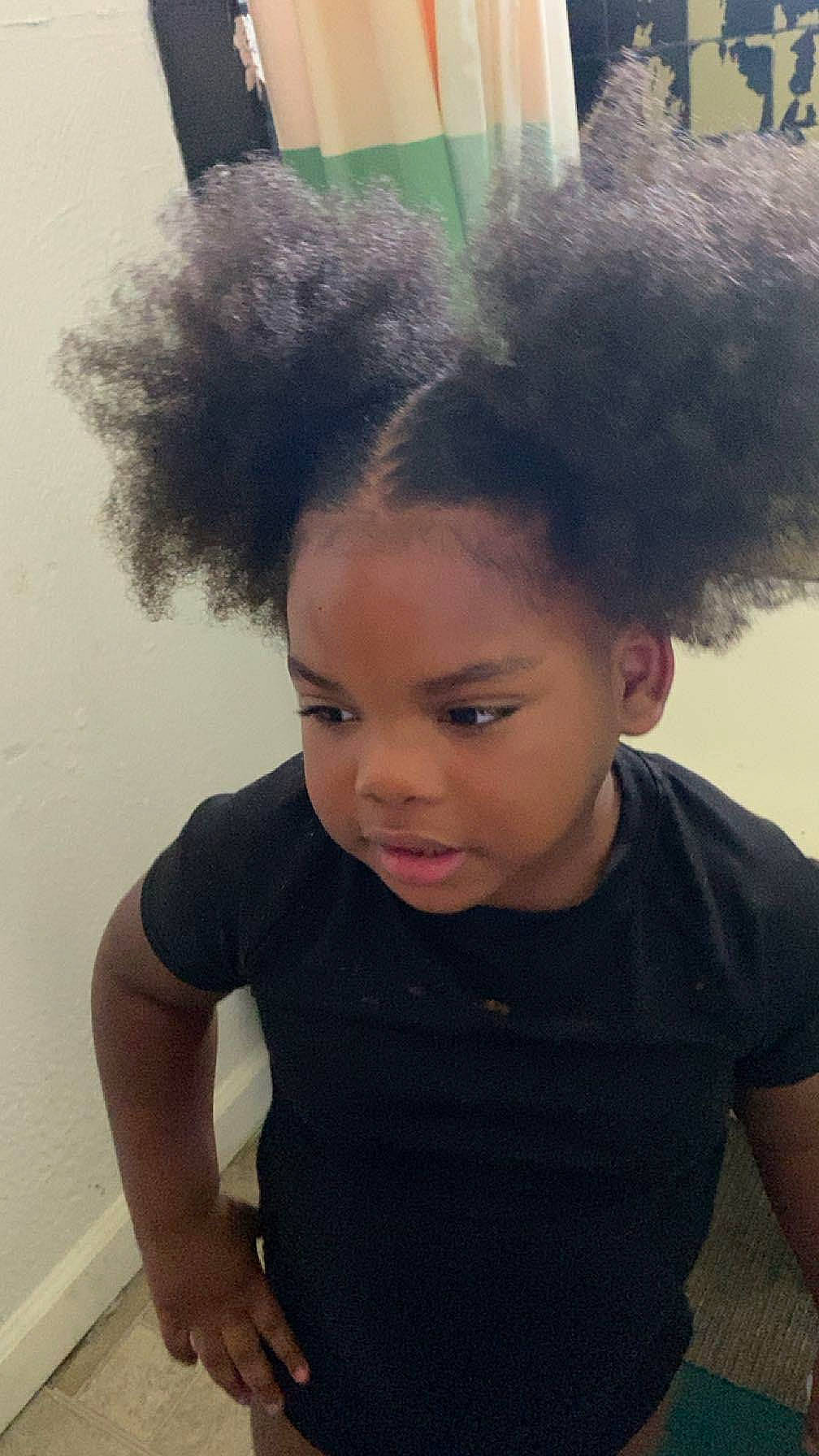 Aliyah is registered to the contest to win money with this photo: afro, black_hair, ear, eyebrow, eyelash, fashion_design, flash_photography, forehead, hair, hairstyle, head, lipstick, long_hair, makeover, nose, person, shoulder, skin, sleeve, t_shirt