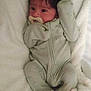 Kaleo joined the competition — help win amazing prizes! baby, infant, pacifier, onesie, blanket, soft, cozy, sleepwear, newborn, cute, lying_down, child, face, head, person, indoors, toddler, warm, comfort, resting