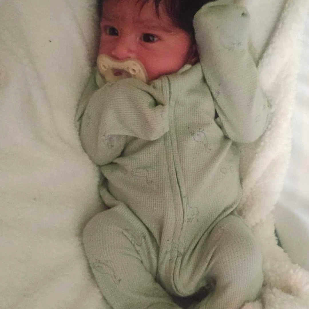 Kaleo joined the competition — help win amazing prizes! baby, blanket, child, comfort, cozy, cute, face, head, indoors, infant, lying_down, newborn, onesie, pacifier, person, resting, sleepwear, soft, toddler, warm