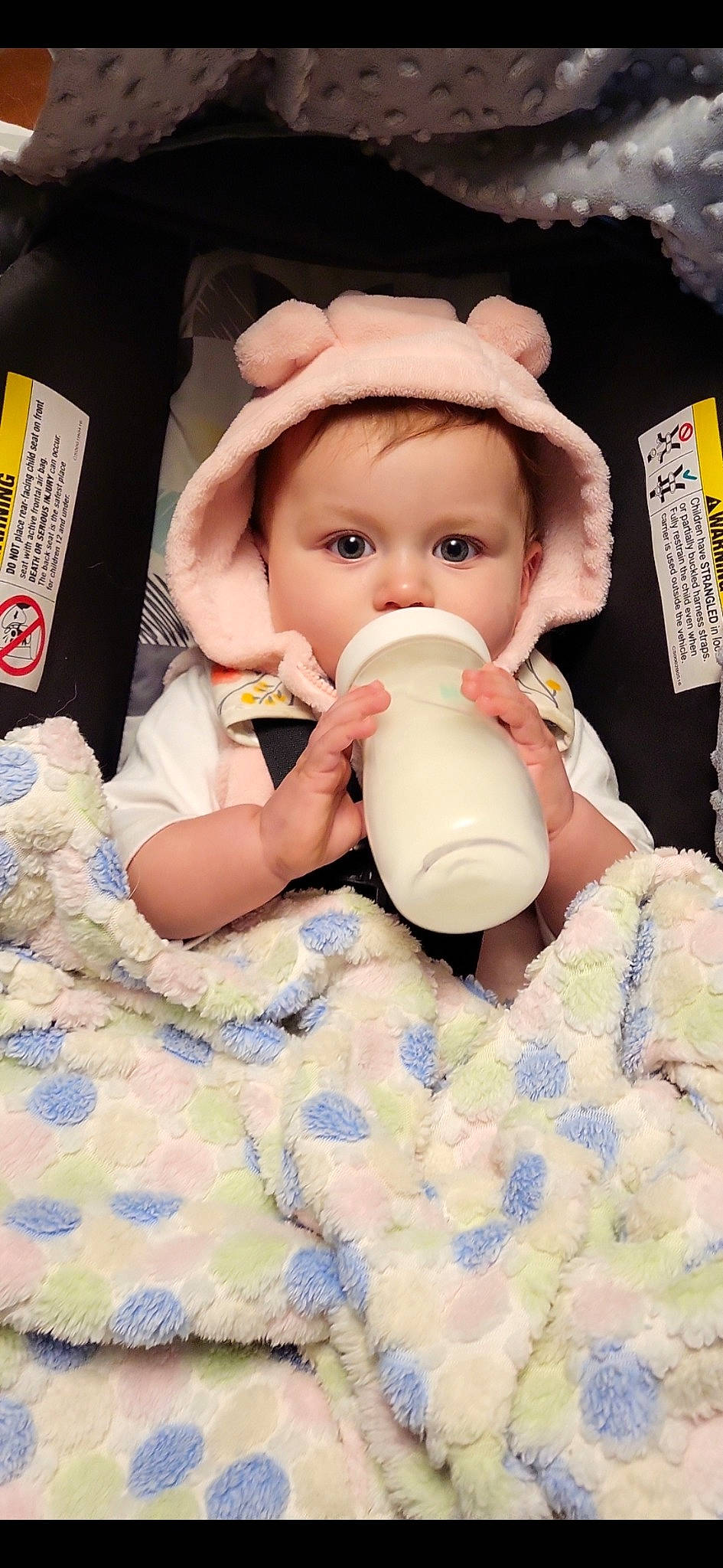 Austyn joined the competition — help win amazing prizes! baby, baby_bottle, baby_toddler_clothing, bottle, cheek, child, drinkware, eyelash, finger, linens, milk, nail, person, plant_milk, plastic_bottle, serveware, skin, tableware, textile, thumb