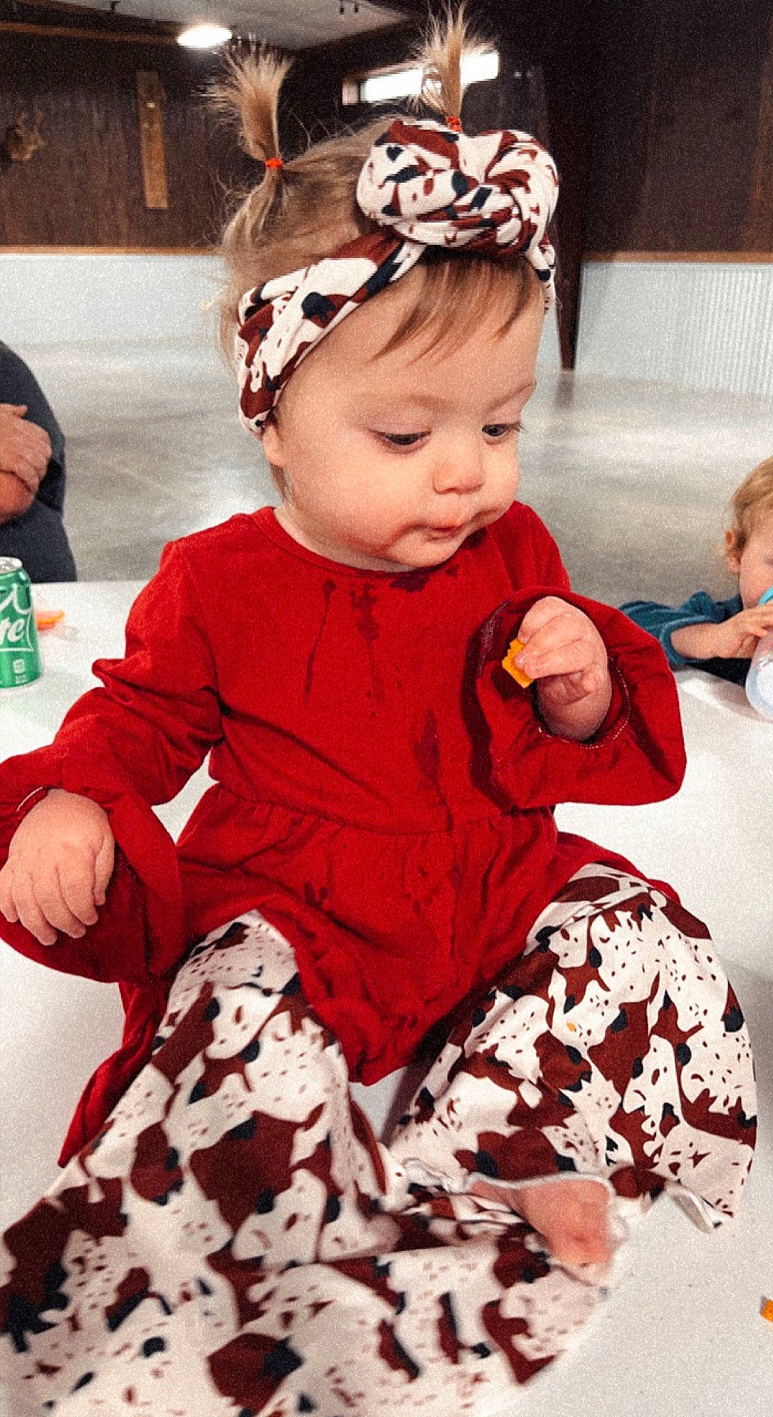 Mckinley joined the competition — help win amazing prizes! baby, baby_toddler_clothing, cheek, child, event, face, fashion, fun, happy, head, headband, organ, outerwear, pattern, person, pink, red, skin, sleeve, textile