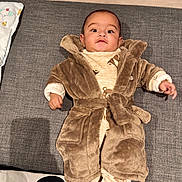 Devansh joined the competition — help win amazing prizes! baby, blanket, child, clothing, couch, cozy, cute, expression, face, foot, furniture, home, indoor, infant, lying, person, pillow, robe, soft, warm