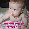 baby, infant, child, blue_eyes, bead_necklace, blanket, indoor, floor, person, skin, head, curious, milestone, text_overlay, pink_text, young_child, crawling, home, soft_toys, development