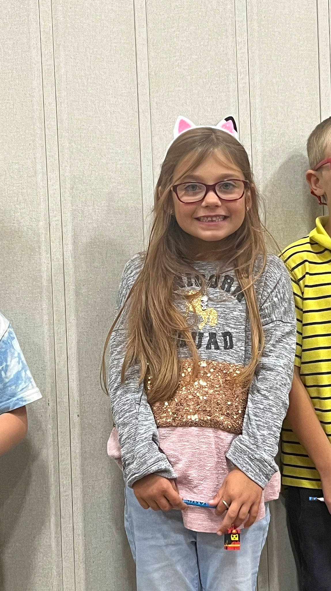 Aleena is registered to the contest to win money with this photo: abdomen, belt, blurred, cool, electric_blue, event, eyewear, face, fashion_design, fun, glasses, happy, jewellery, joy, necklace, pattern, person, sleeve, smile, t_shirt