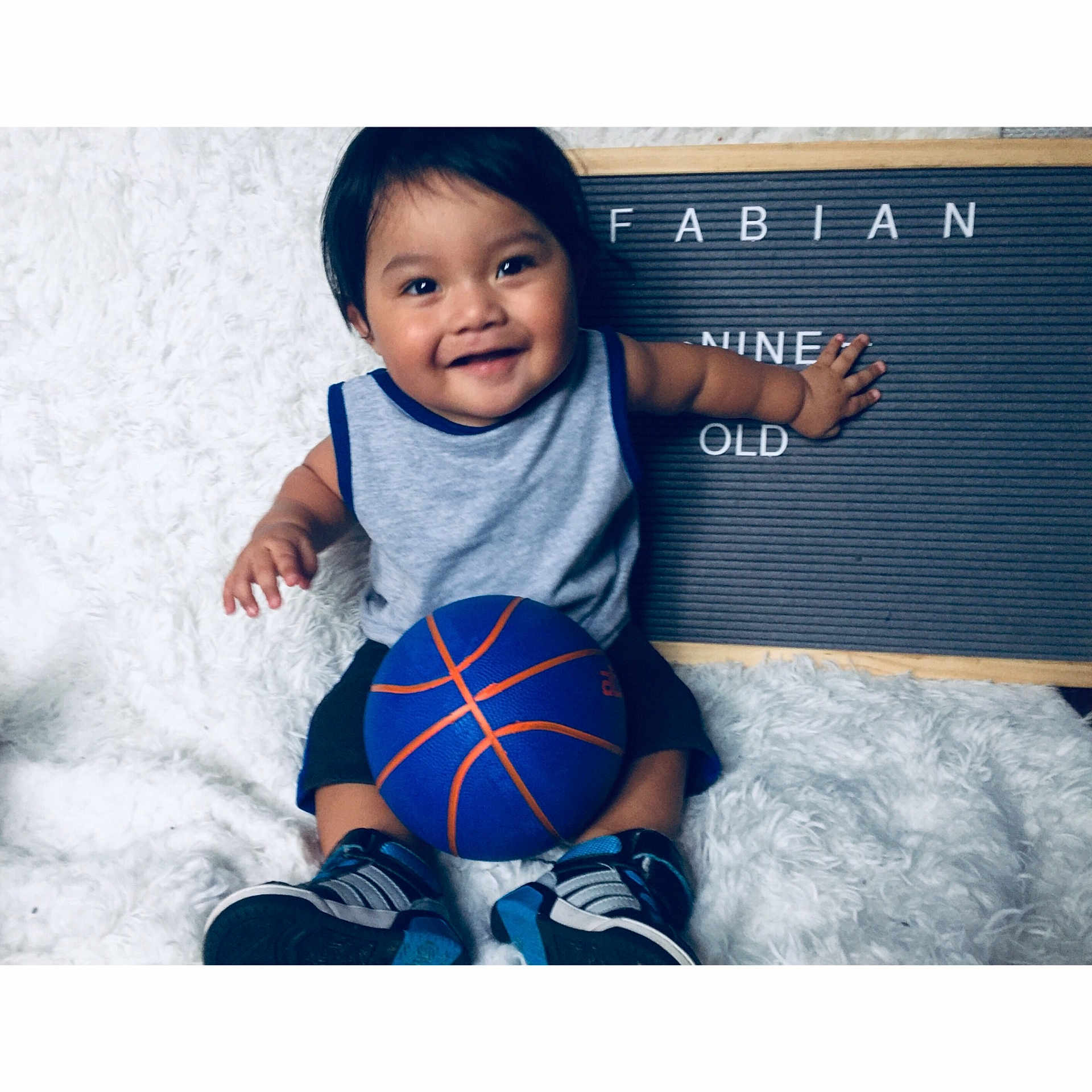 Fabian joined the competition — help win amazing prizes! baby, ball, blue, child, cool, facial_expression, football, happy, jersey, joy, male, outerwear, person, play, sleeve, smile, soccer_ball, sportswear, t_shirt, textile
