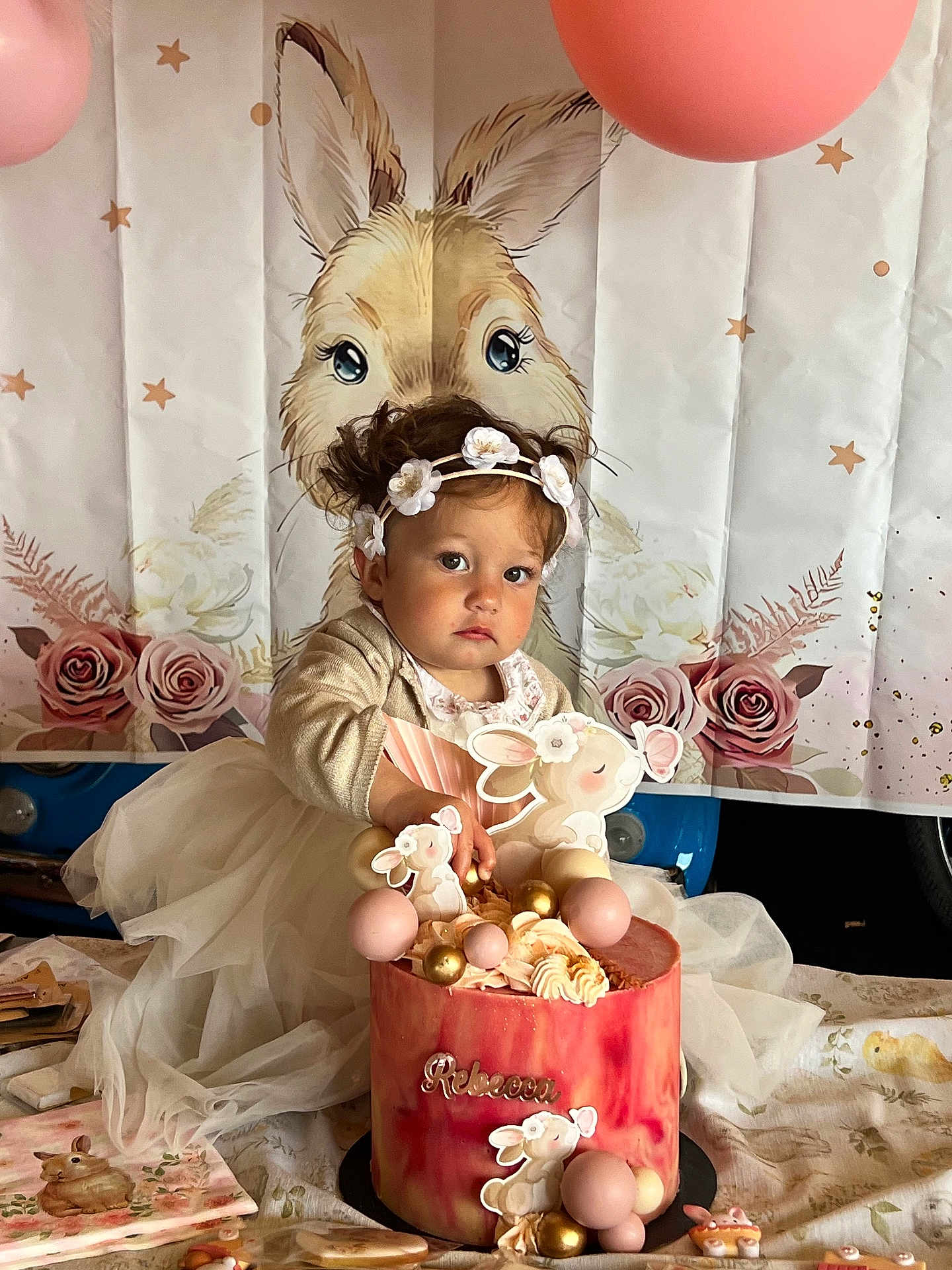 Rebecca participe au concours pour gagner de l'argent avec cette photo : balloons, birthday, bunny, cake, celebration, child, decorations, dress, face, festive, flowers, gold, headband, illustration, party, person, pink, roses, tablecloth, toddler