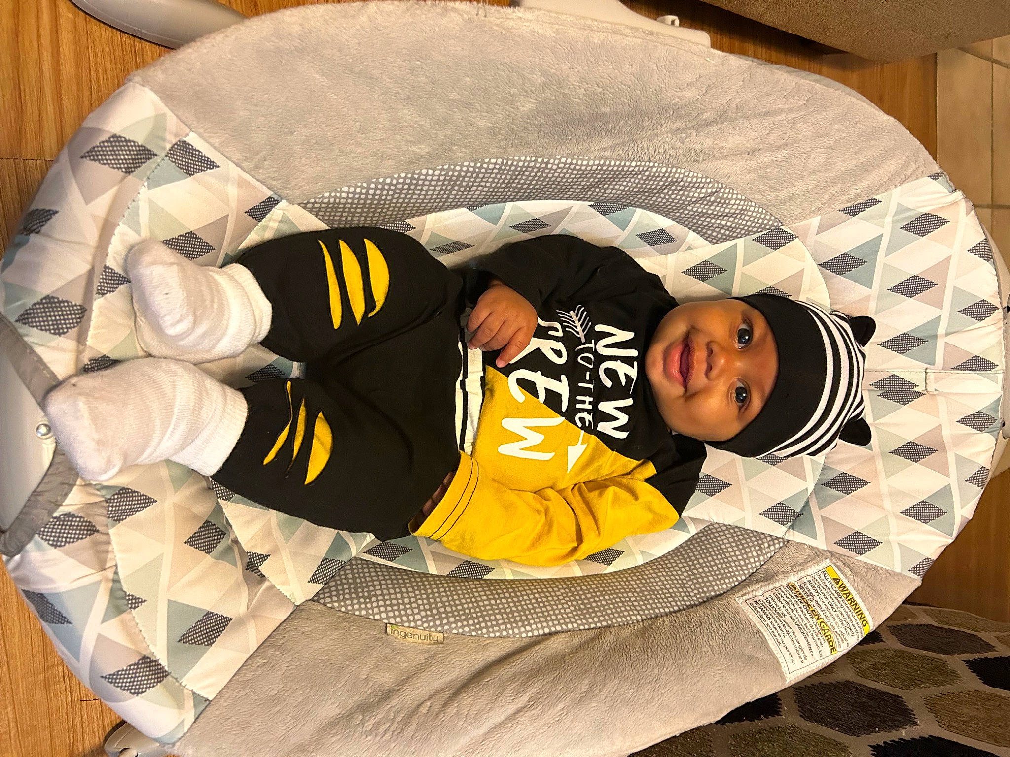 Hakeem joined the competition — help win amazing prizes! baby_products, baby_safety, baby_sleeping, baby_toddler_clothing, bag, child, circle, comfort, flooring, headwear, joy, linens, nap, pattern, person, product, room, sitting, sleep, sleeve