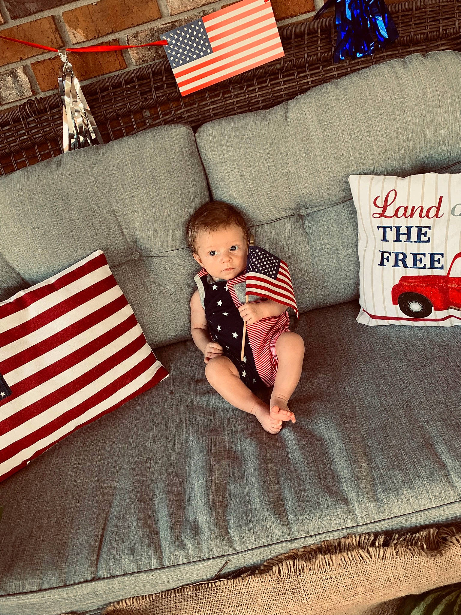 Justice joined the competition — help win amazing prizes! baby, baby_toddler_clothing, child, comfort, electronic_device, flag, flag_of_the_united_states, flooring, happy, linens, pattern, person, product, rectangle, red, sleeve, t_shirt, textile, tints_and_shades, toddler
