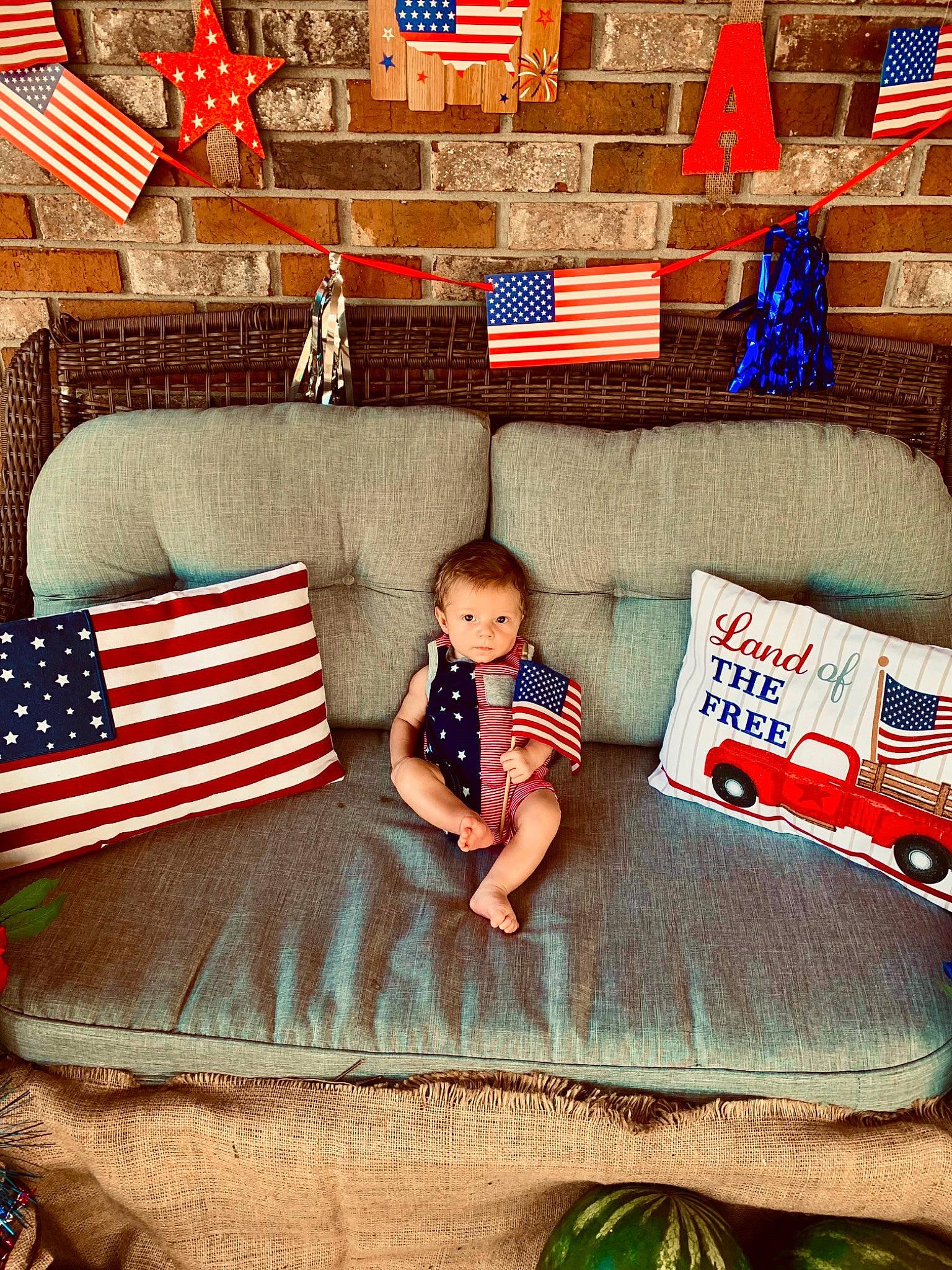 Justice joined the competition — help win amazing prizes! baby_toddler_clothing, blue, child, comfort, couch, flag_of_the_united_states, happy, interior_design, linens, living_room, mammal, person, photograph, product, rectangle, red, room, t_shirt, textile, toddler