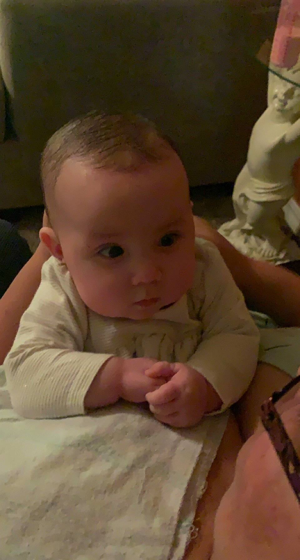 Mercedes is registered to the contest to win money with this photo: baby, baby_toddler_clothing, cheek, child, comfort, eyebrow, finger, hand, linens, nail, person, sitting, skin, thumb, toddler