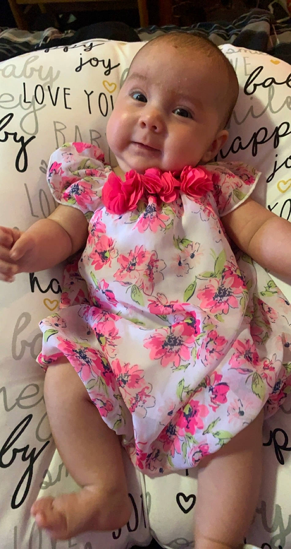 Mercedes is registered to the contest to win money with this photo: abdomen, baby, baby_products, baby_toddler_clothing, cheek, child, diaper, leg, pattern, person, photo_caption, pink, plant, product, skin, textile, thigh, toddler