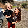 Lydiah joined the competition — help win amazing prizes! barefoot, car, casual_clothing, children, curly_hair, daylight, fall, fun, happy, holding, joy, long_hair, nature, outdoor, playful, road, rustic, siblings, smiling, trees