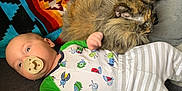 Tobias joined the competition — help win amazing prizes! baby, infant, cat, pet, blanket, colorful_blanket, striped_pants, pacifier, hand_holding, fur, sleeping_cat, cozy, indoor, bed, resting, cute, child, animal, soft_texture, relaxation