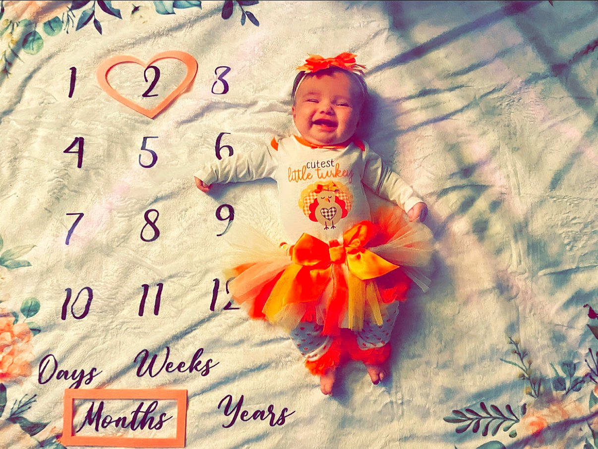 Lakelyn joined the competition — help win amazing prizes! adaptation, art, baby, baby_toddler_clothing, child, cloud, font, fun, happy, headwear, illustration, love, magenta, morning, pattern, people_in_nature, person, petal, photo_caption, t_shirt