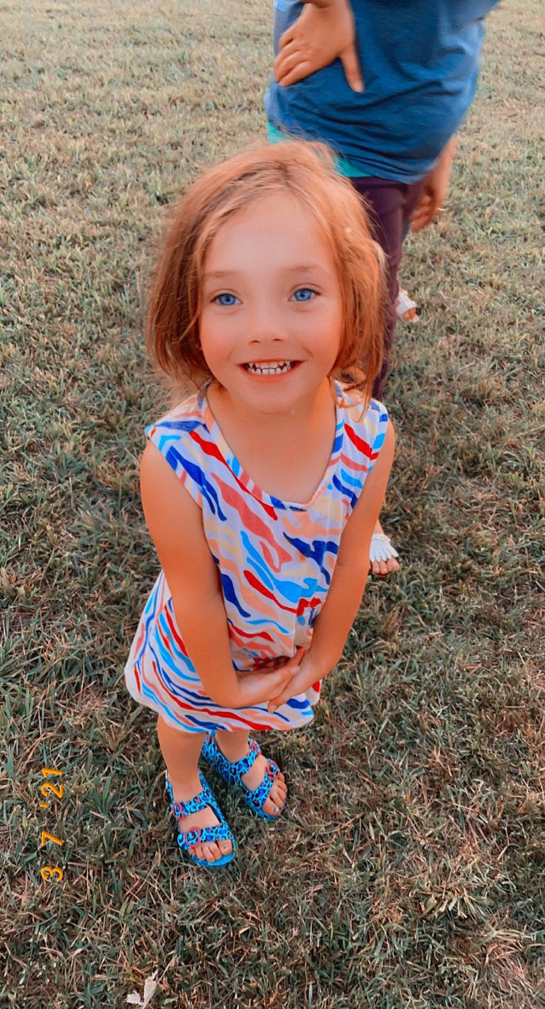 Braelyn is registered to the contest to win money with this photo: baby_toddler_clothing, blue, child, electric_blue, facial_expression, fun, grass, happy, joy, leaf, leg, leisure, mammal, nature, people_in_nature, person, plant, shoe, smile, standing