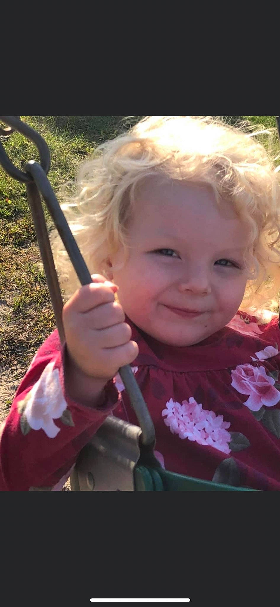 Rosella is registered to the contest to win money with this photo: baby_toddler_clothing, blond, cheek, child, eye, eyebrow, eyelash, face, finger, happy, iris, joy, lip, mouth, nose, person, petal, product, summer, swing