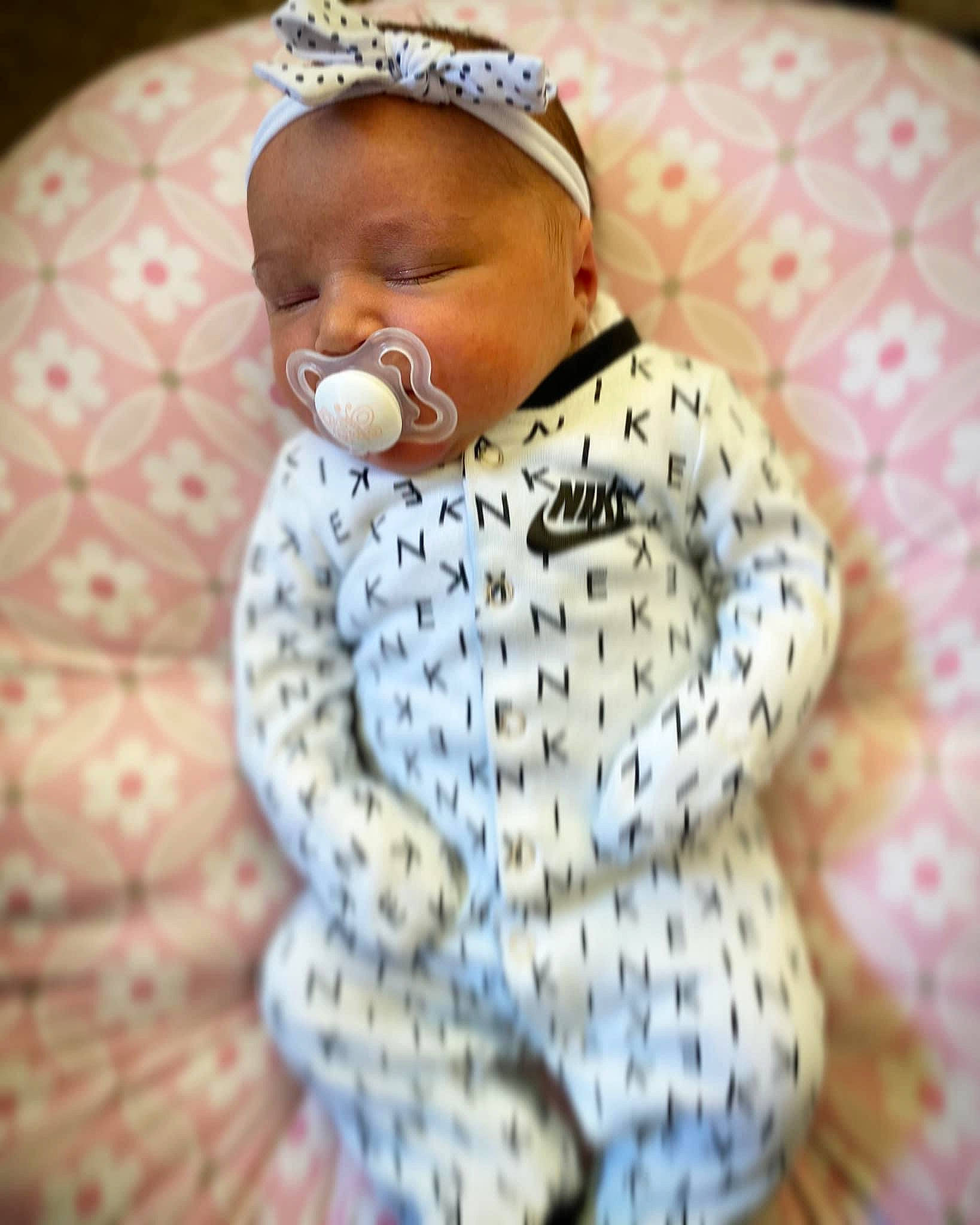 Alaina is registered to the contest to win money with this photo: baby, baby_products, baby_sleeping, baby_toddler_clothing, bedtime, cap, carmine, child, comfort, fashion_accessory, fur, happy, knit_cap, linens, pattern, person, room, sleeve, textile, toddler